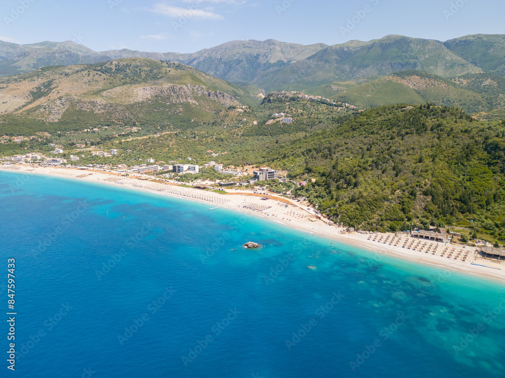 Aerial view of beach clubs along the Himare coastline part of the Albanian Riviera on the Ionian Sea in southern Albania Aerial view of beach clubs along the Himare coastline part of the Albanian Riviera on the Ionian Sea in southern Albania