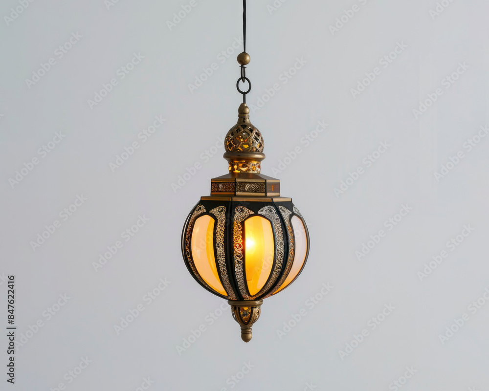 A traditional, ornate hanging lantern with intricate designs and a warm glow emanates from a white background. A traditional, ornate hanging lantern with intricate designs and a warm glow emanates from a white background.