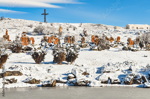 snow covered Armenian Alphabet Memorial Park and Holy Cross monument in winter (Artashavan, Armenia) photo