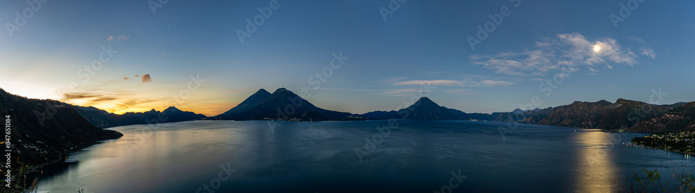 Lake Atitlan with its mountains and volcanoes during the sunrise Lake Atitlan with its mountains and volcanoes during the sunrise