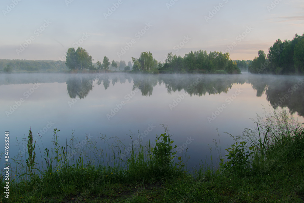 Fototapeta premium misty morning on the lake