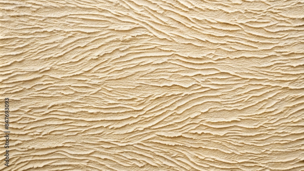 The image shows a textured surface with a light beige or off-white color. The surface appears to have been coated with a thick layer of plaster or stucco , giving it an uneven, rough texture. The image shows a textured surface with a light beige or off-white color. The surface appears to have been coated with a thick layer of plaster or stucco , giving it an uneven, rough texture.