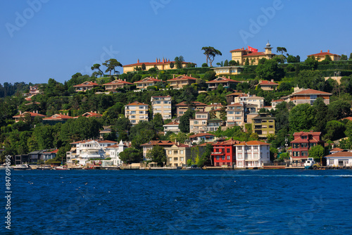 Blue seascape overlooking the coast. View of the Bosphorus in Istanbul city on sunny summer day, in a public place.