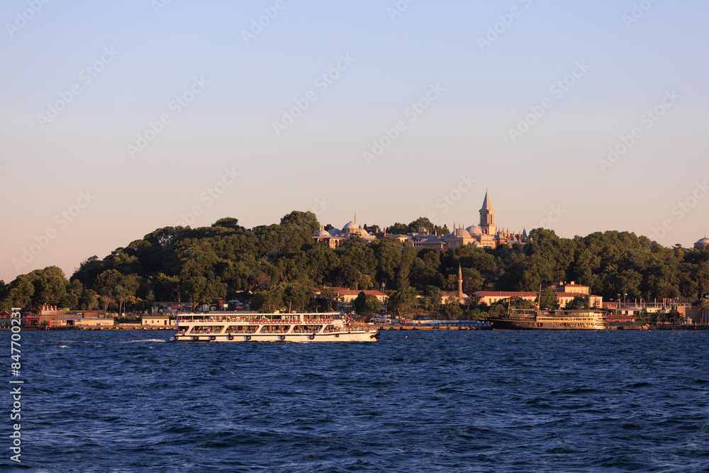 Naklejka premium Evening sea view off the coast of Istanbul. Orange sunset sky