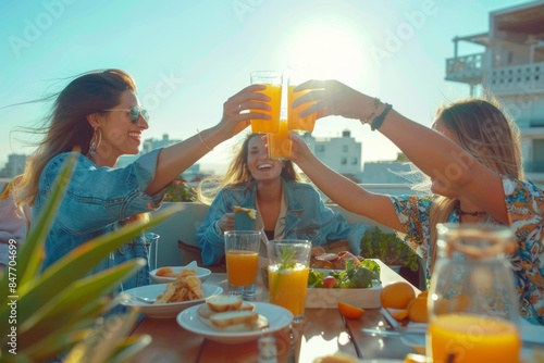 Food and fun at an outdoor restaurant where vegans dine with multiracial people.