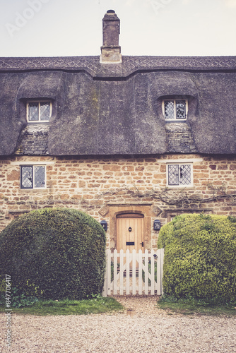 Cotswold Cottages In The Sleepy Village Of Great Tew, Oxfordshire photo