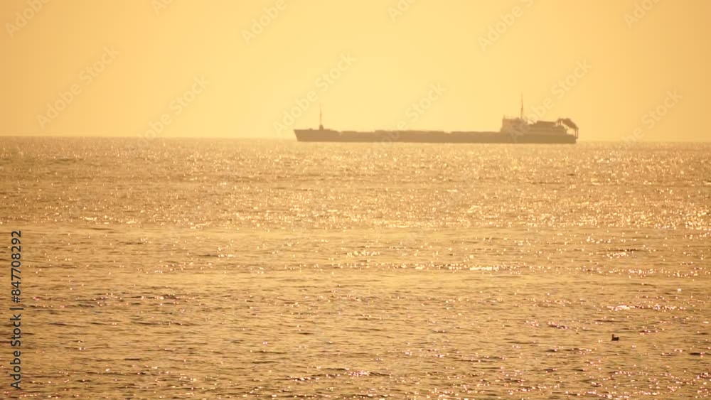 Cargo and dredging industrial ships sailing in to sea horizon. One large cargo ship grain carrier tanker in sea on sunny day. Transport, sea freight, sea transportation of cargo. Aerial view Cargo and dredging industrial ships sailing in to sea horizon. One large cargo ship grain carrier tanker in sea on sunny day. Transport, sea freight, sea transportation of cargo. Aerial view