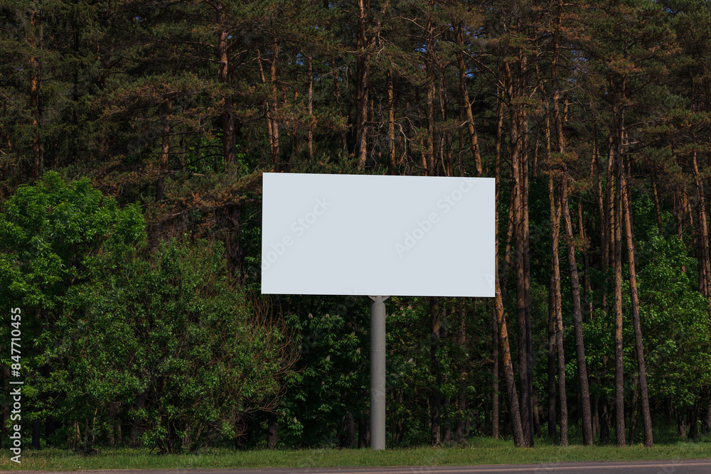 White billboard along the highway. Background for design and advertising. 