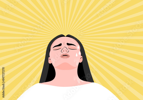 Low angle view of a woman standing in the hot sun and sweating.