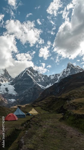 Vertical 4k Timelapse, Base Camp Tents Under Huayhuash Mountain, Andes, Peru photo