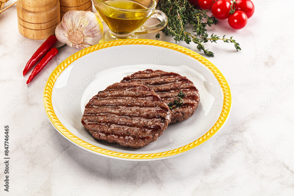 Grilled beef cutlet for burger Grilled beef cutlet for burger