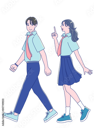 笑顔で歩く制服を着たアニメ風の男女の学生