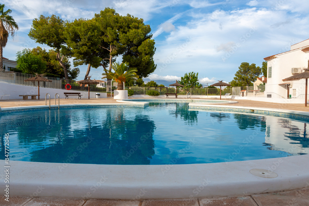 Inviting residential pool with clear sky Inviting residential pool with clear sky