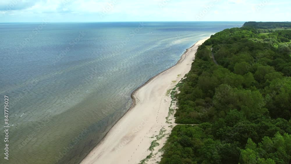 the deserted beach of the Baltic Sea under a cloudy sky the deserted beach of the Baltic Sea under a cloudy sky
