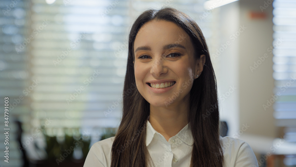 Smiling Caucasian joyful positive girl lady businesswoman indoors looking at camera young business woman pretty face posing alone at home office happy millennial student professional close up portrait Smiling Caucasian joyful positive girl lady businesswoman indoors looking at camera young business woman pretty face posing alone at home office happy millennial student professional close up portrait