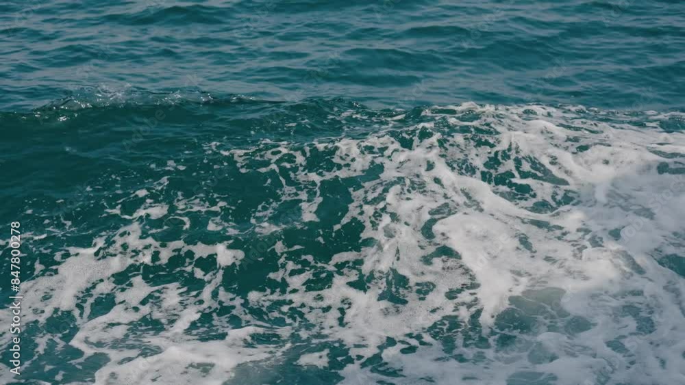 Beautiful deep blue Sea water. Ocean waves. Cruise ship vacation Thailand. Environmental and nature with deep blue sea. Reflection of sky and Boat Wake in the sea. High quality 4k footage Beautiful deep blue Sea water. Ocean waves. Cruise ship vacation Thailand. Environmental and nature with deep blue sea. Reflection of sky and Boat Wake in the sea. High quality 4k footage