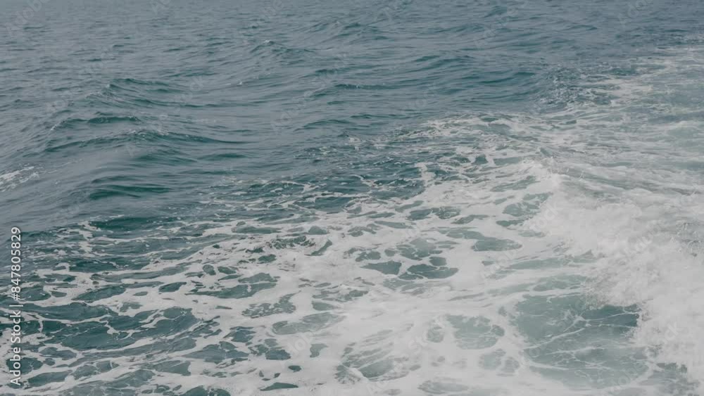 Beautiful deep blue Sea water. Ocean waves. Cruise ship vacation Thailand. Environmental and nature with deep blue sea. Reflection of sky and Boat Wake in the sea. High quality 4k footage Beautiful deep blue Sea water. Ocean waves. Cruise ship vacation Thailand. Environmental and nature with deep blue sea. Reflection of sky and Boat Wake in the sea. High quality 4k footage