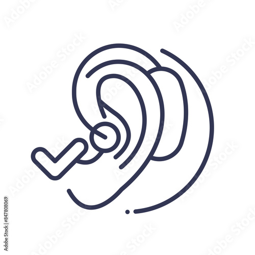 Line art of an ear with a hearing aid and a check mark.