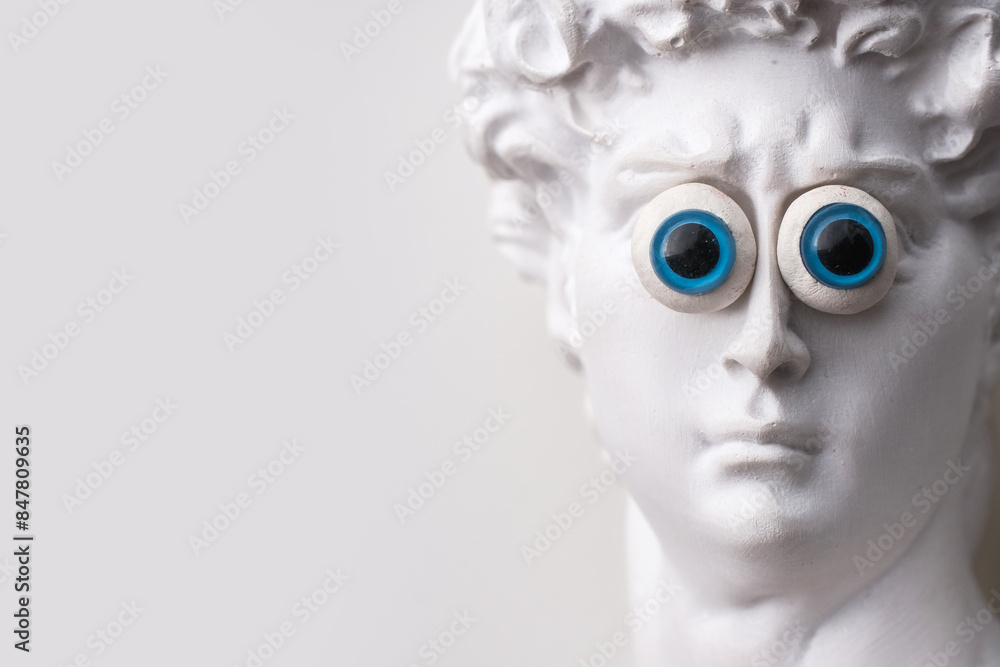 custom made wallpaper toronto digitalPlaster sculpture of David's head with bulging eyes. Plaster copy of an antique statue on a light background.