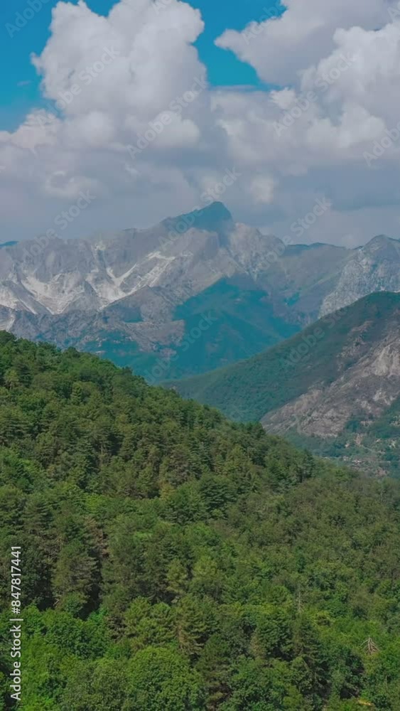 Aerial descending vertical shot of marble quarry in Carrara, Italy Aerial descending vertical shot of marble quarry in Carrara, Italy