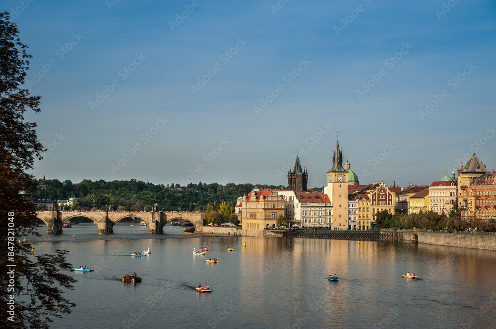 Obraz premium Vltava embankment in Prague, Charles Bridge and a beautiful panorama of the old town