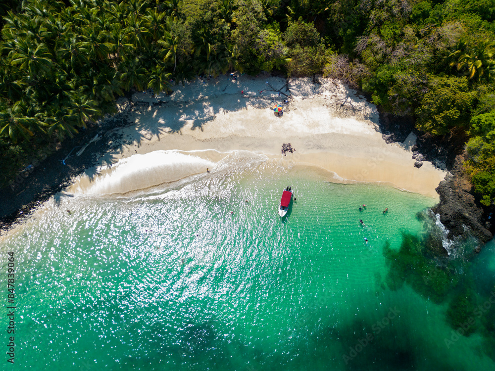 Aerial top view of Bolaños tropical island beach with white sand and emerald water, Chiriquí gulf, Chiriquí province, Panamá, Central America - stock photo