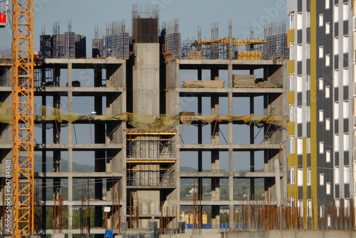 Concrete frame of a high rise apartment building under construction. Stock photo for modern construction illustration. Ust-Kamenogorsk (kazakhstan)