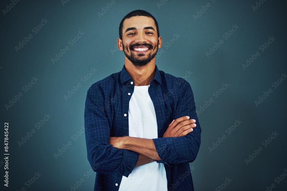 Arms crossed, designer or portrait of happy man with fashion, pride and confidence in studio. Trendy model, male person or entrepreneur with smile, mockup space or style isolated on dark background Arms crossed, designer or portrait of happy man with fashion, pride and confidence in studio. Trendy model, male person or entrepreneur with smile, mockup space or style isolated on dark background