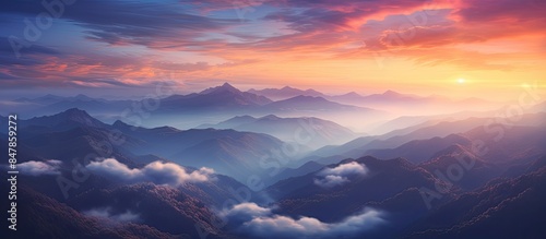 Fototapeta Naklejka Na Ścianę i Meble -  Beautiful sunset The mountains are covered with clouds. Creative banner. Copyspace image