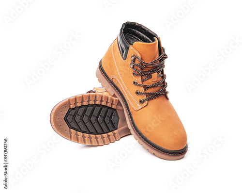 Yellow winter boot isolated on white background.
