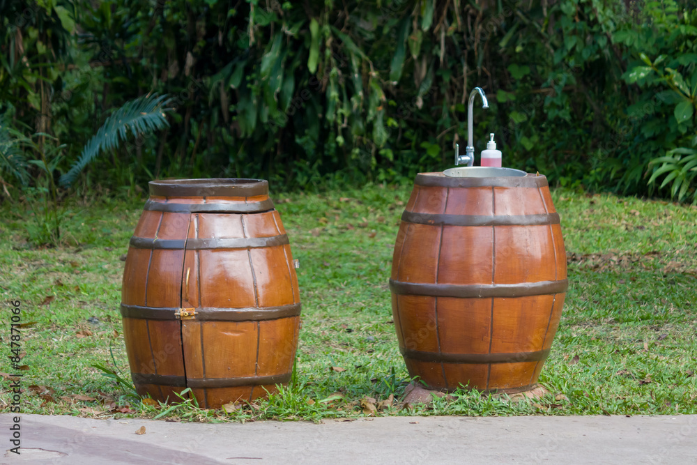 barrel-shaped hand washing station in the garden barrel-shaped hand washing station in the garden