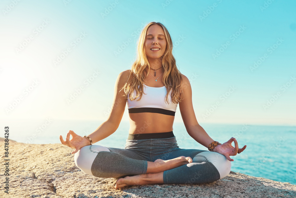 Outdoor, happy and woman with chakra for yoga, wellness and spiritual peace in California. Zen, female yogi and hands with lotus pose for meditation, relaxing and mental health on beach in nature Outdoor, happy and woman with chakra for yoga, wellness and spiritual peace in California. Zen, female yogi and hands with lotus pose for meditation, relaxing and mental health on beach in nature