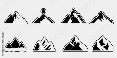 Vector set of black and white mountain silhouettes, background border of rocky mountains