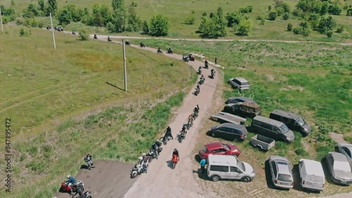 Festival of motorbikers in the countryside. Large accumulation of motorcycles, top view. 05.22.2024 Kyiv Ukraine. photo