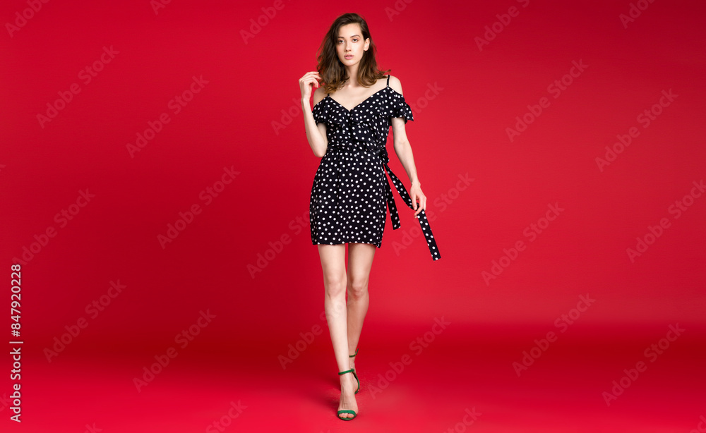 stylish woman in summer fashion trend dress on red background stylish woman in summer fashion trend dress on red background