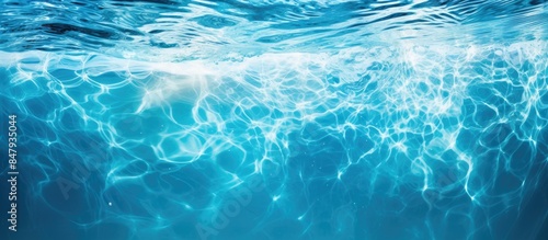 Water wave under swimming pool with light reflecting Texture background. Creative banner. Copyspace image