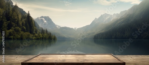 wooden platform before lake with mountain. Creative banner. Copyspace image