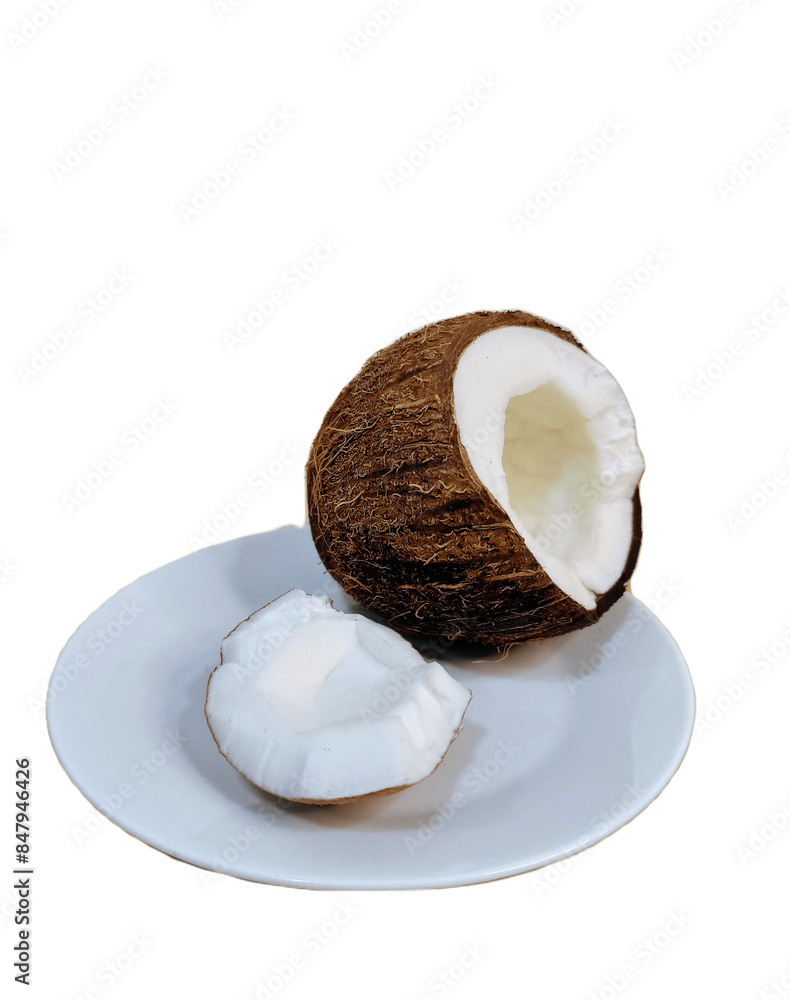 cut coconut on a white plate cut coconut on a white plate