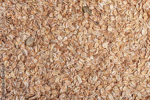 Oat flakes texture background, close up. Oatmeal.