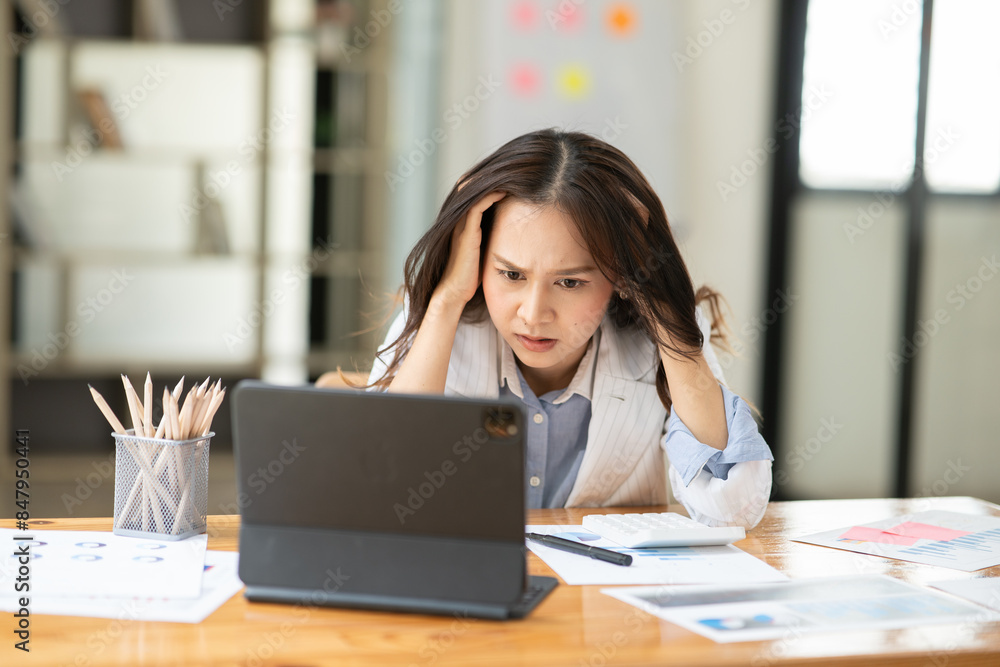 Businesswomen Working and talking about work documents at the office. Businesswomen Working and talking about work documents at the office.