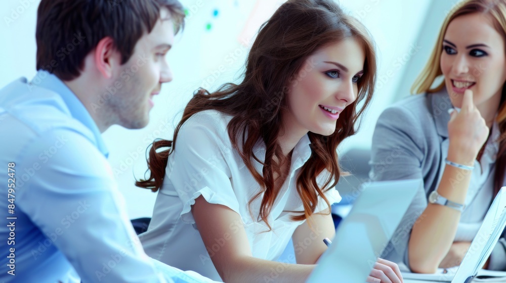 A Collaborative Moment: Business Partners Discuss Documents in a Modern Office Setting A Collaborative Moment: Business Partners Discuss Documents in a Modern Office Setting