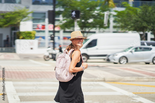 Picture from Miami of woman on a pedestrian crossing