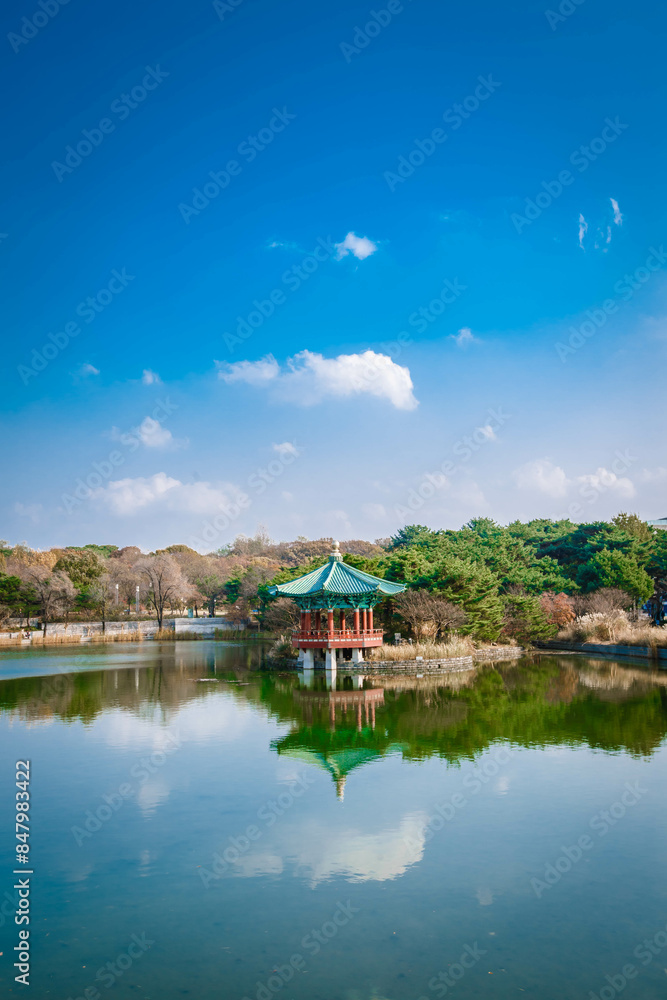 Sunset at the Hyangwonjeong Pavilion in the center of the pond in the Gyeongbokgung palace, Seoul, South Korea.