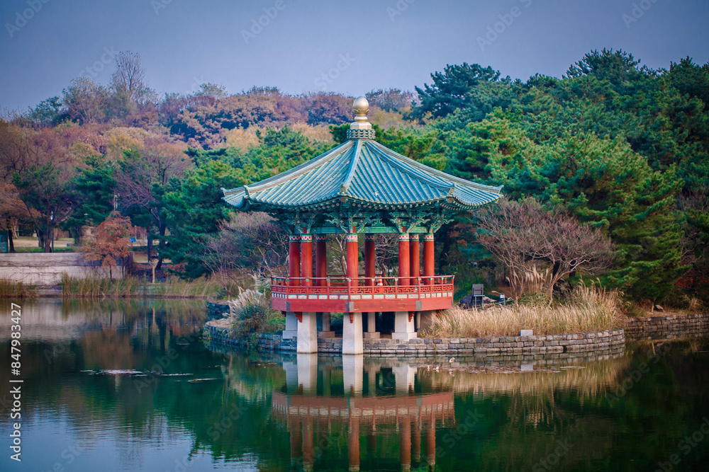 Sunset at the Hyangwonjeong Pavilion in the center of the pond in the Gyeongbokgung palace, Seoul, South Korea.