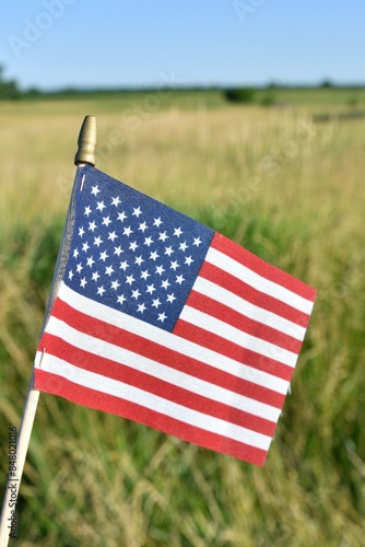 American Flag in a Farm Field photo