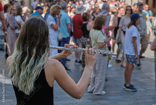 Street performer with transverse flute