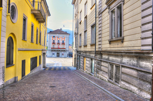 Cobblestone Road with Colorful Houses in City of Locarno, Ticino, Switzerland.