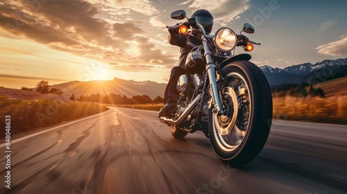 Wallpaper Mural A motorcyclist rides on a scenic highway at sunset, capturing the spirit of adventure and freedom on the open road. Torontodigital.ca