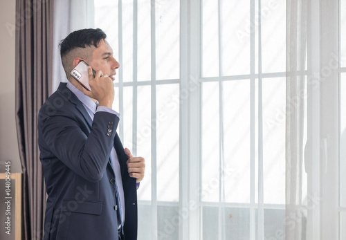Businessman on Phone in Office