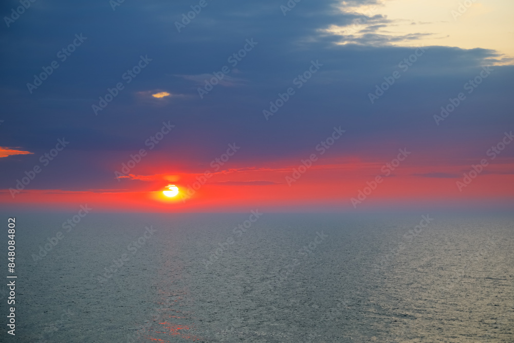 Φωτογραφία Colors of the sunset over the Baltic Sea as seen from the village of Ustronie-Mo